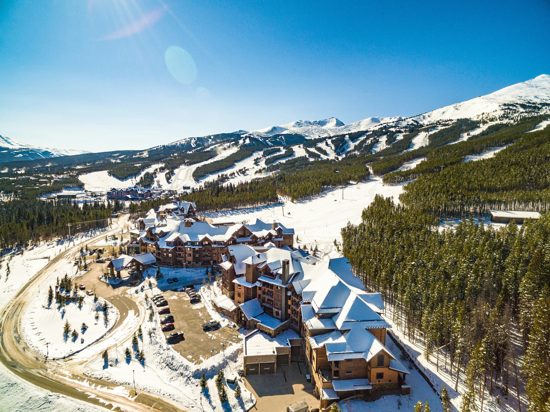 Aerial of slopeside lodges at the base of Breckenridge's Peak 7 in winter
