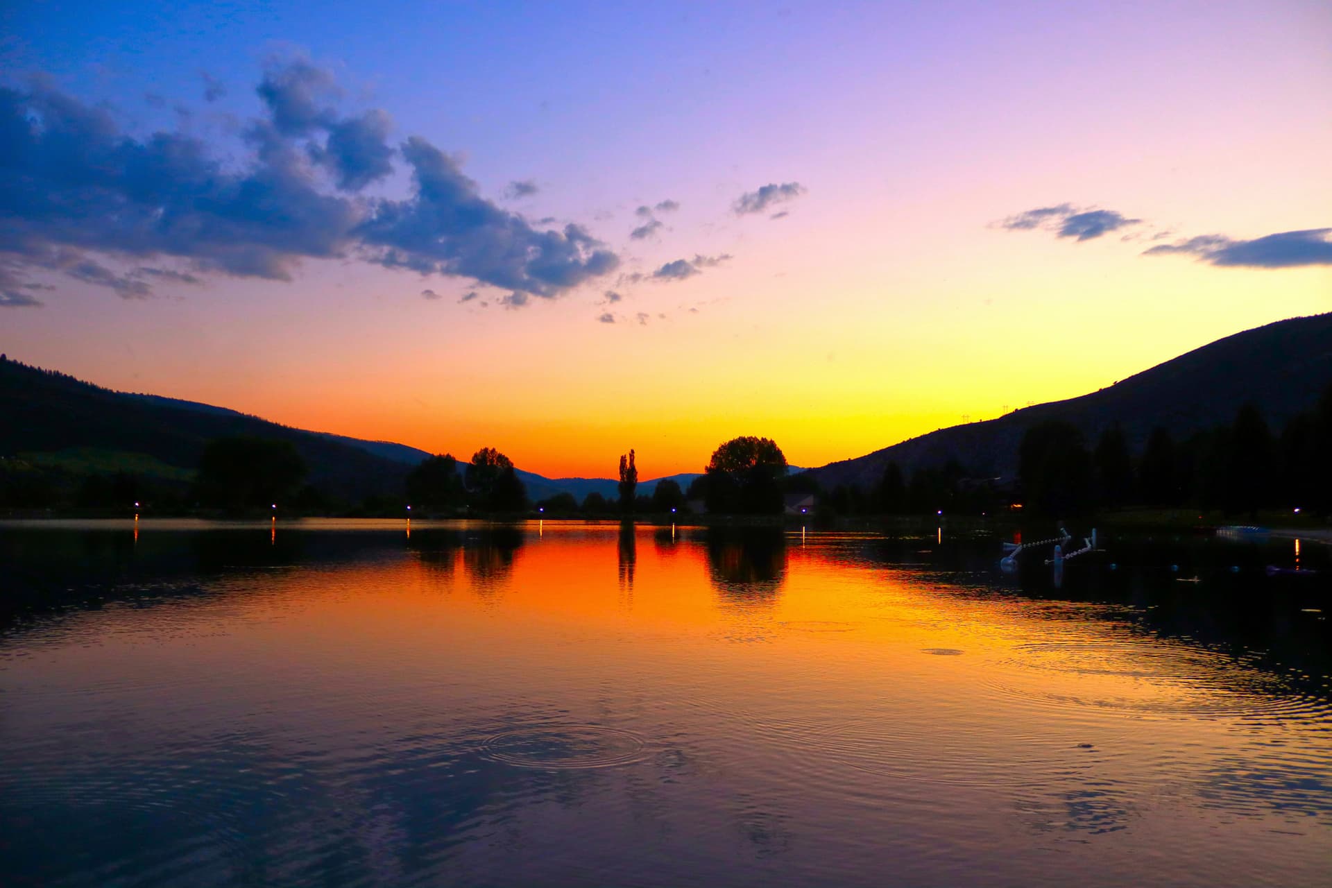 Sunset over Nottingham Lake in Avon with the valley hills in silhouette