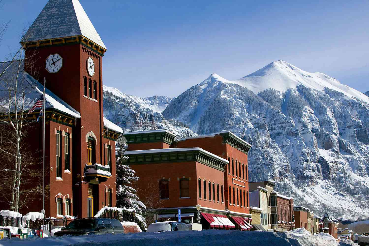 Telluride downtown Main Street in winter with snow and Victorian buildings